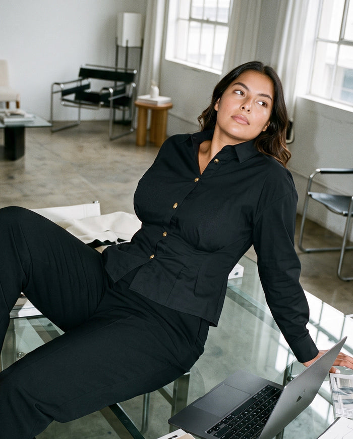 Model wearing the She Shapes Blouse Aura in Black
